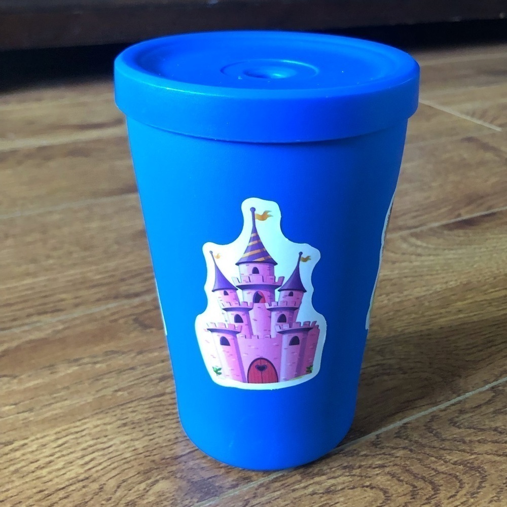 Blue steel cup with lid and stickers